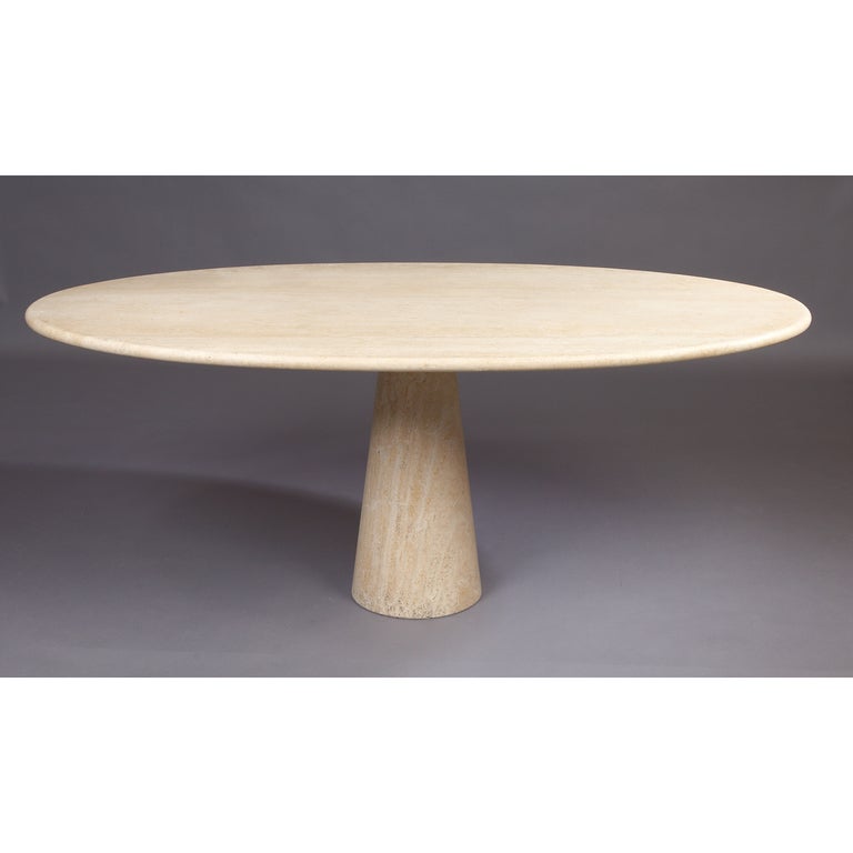Italy, 1960's

Oval pedestal dining table in travertine