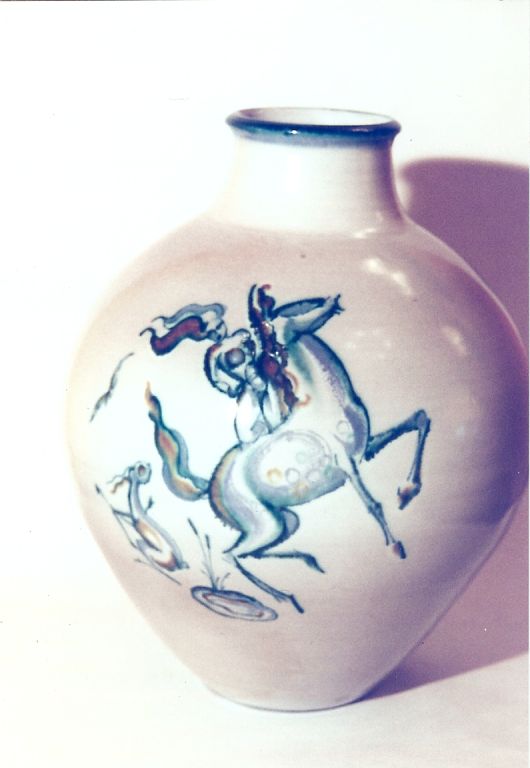 France, circa 1950
A fine glazed earthenware vase with beautiful depictions of Amazons astride prancing horses. Painted on both sides with different decor.
Interesting but unknown mark.
Measure: 15 H x 11 D.