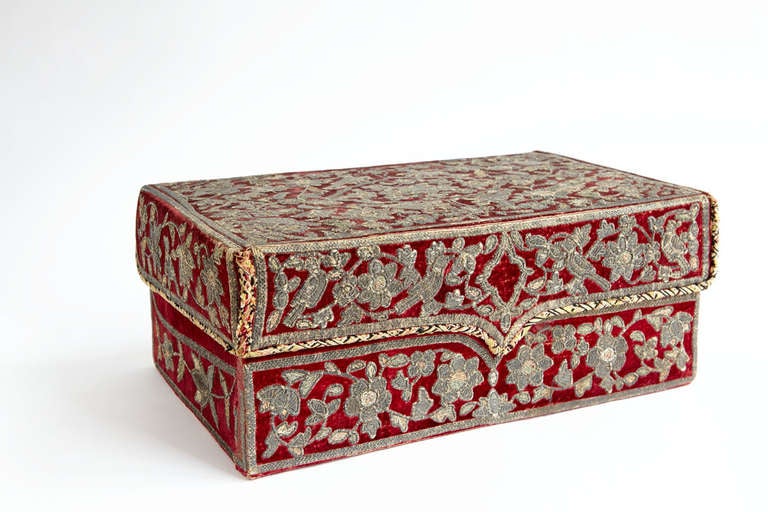 An 18th century Continental red silk velvet covered box with silver metallic rapport embroidery