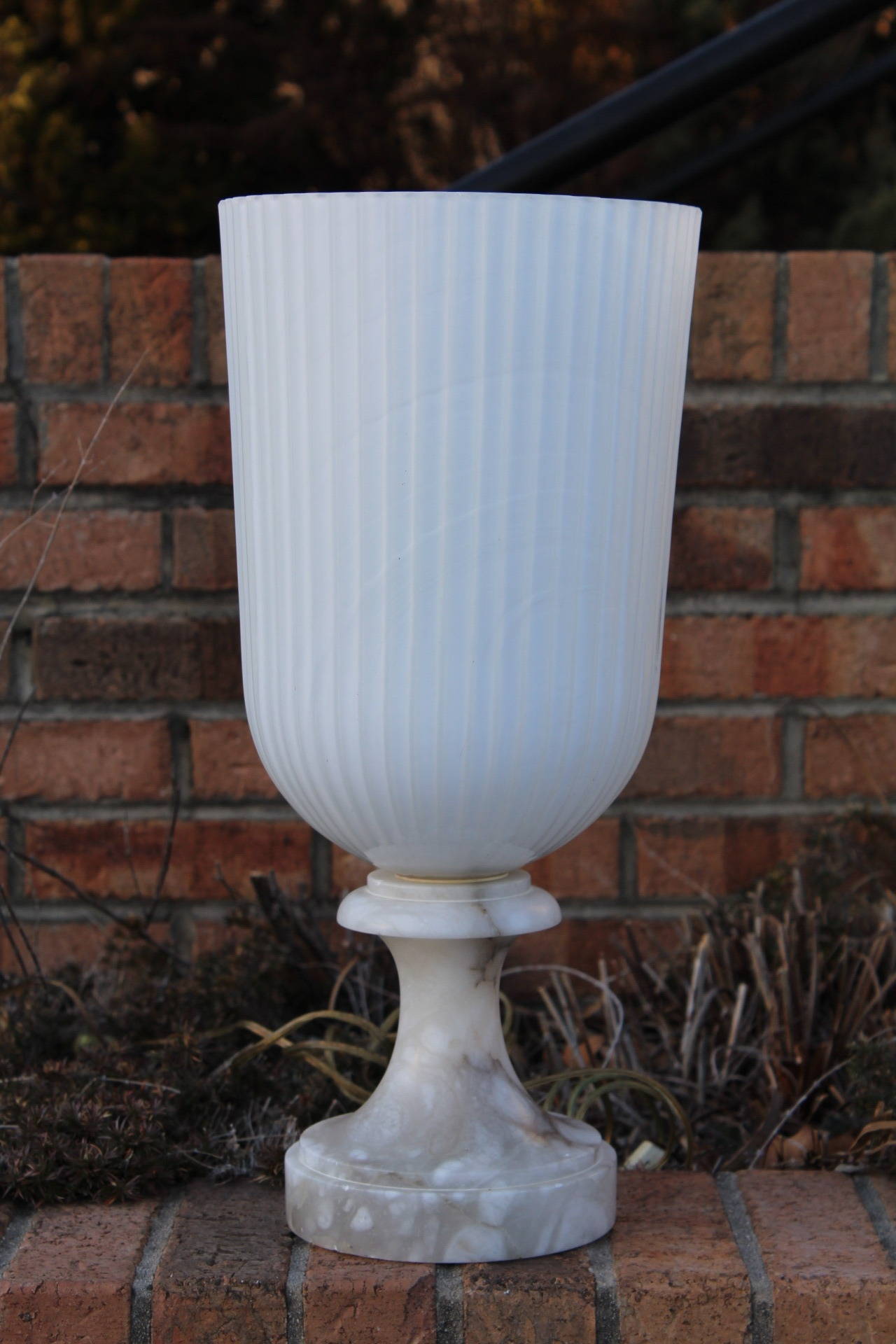 Wonderful marble and glass up light or table lamp by Sarreid, Italy, circa 1970. The shade is composed of two types of glass, milk glass on the interior which acts as a light diffuser, softening the light and clear glass on the outside, allowing the