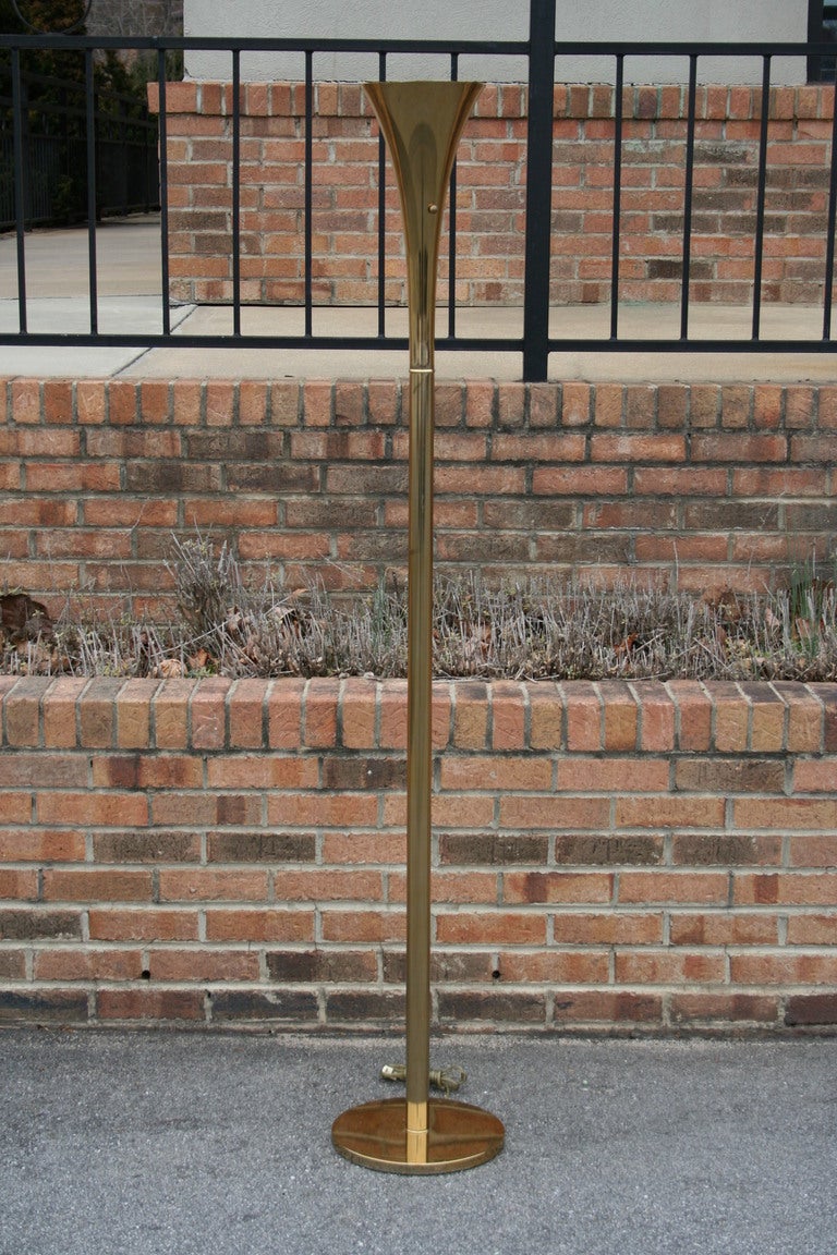 A Brass Torchiere Floor Lamp by Laurel