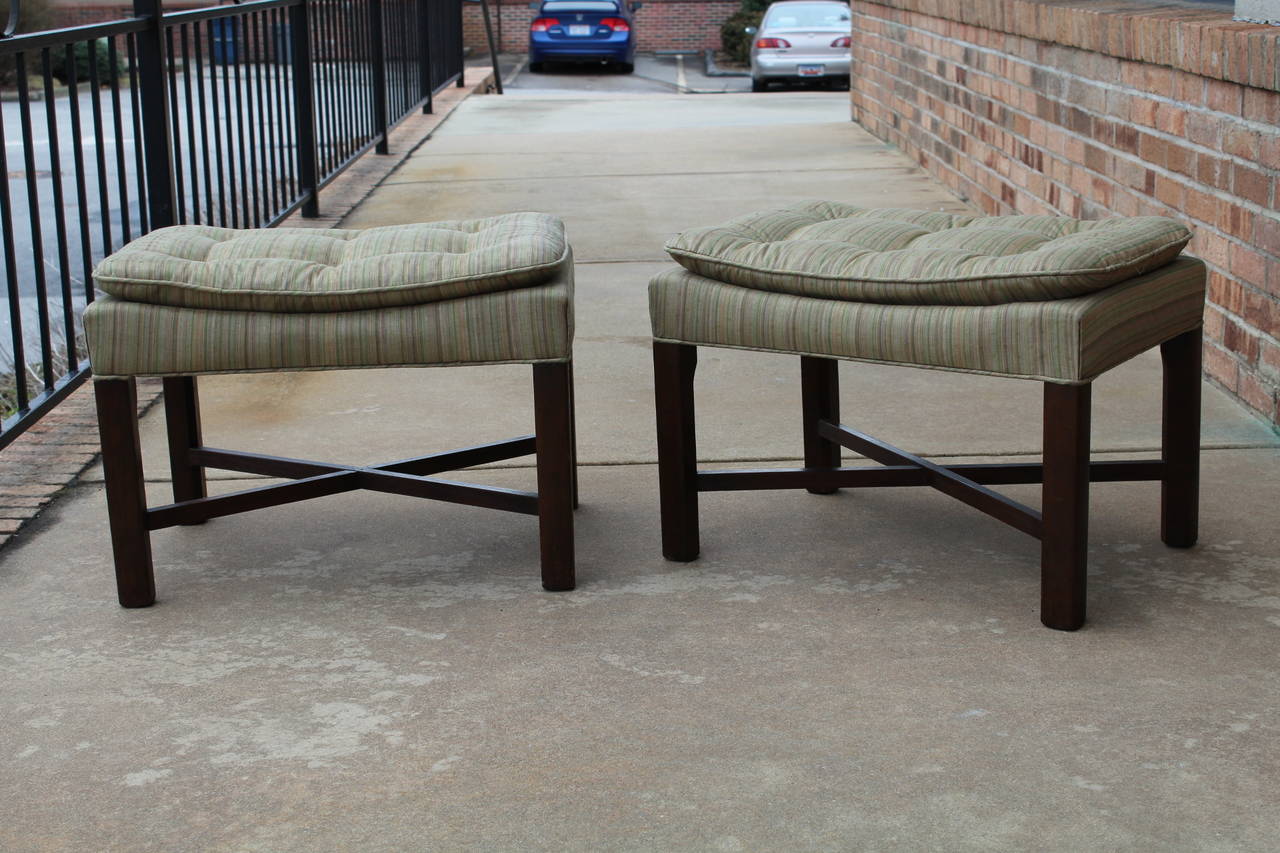 Pair of 1960s walnut upholstered stools or benches, probably Baker.