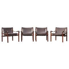Four Teak and Rosewood Safari Chairs by Arne Norell