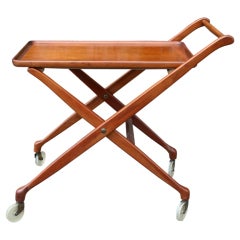A Sculptural Walnut Folding Bar Cart