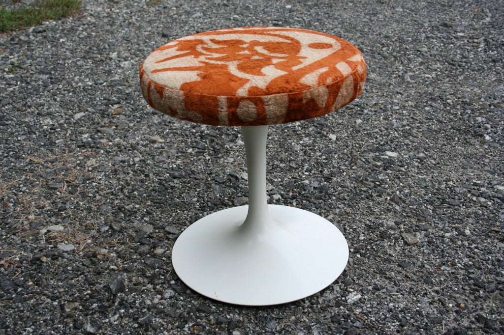 A wonderful early example of Saarinen's famous tulip base stool with original Knoll fabric, possibly designed by Jack Lenor Larsen. Stool is shorter than later production models by a few inches.