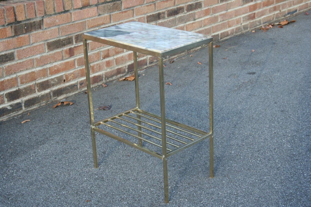 A Polished Brass and Marble Side Table