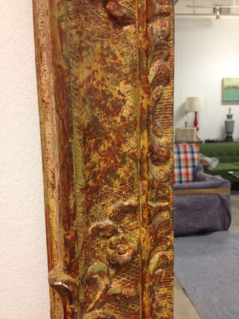 Mid-Century Modern A Mid 20th C. Italian Gilt Carved Wall Mirror For Sale