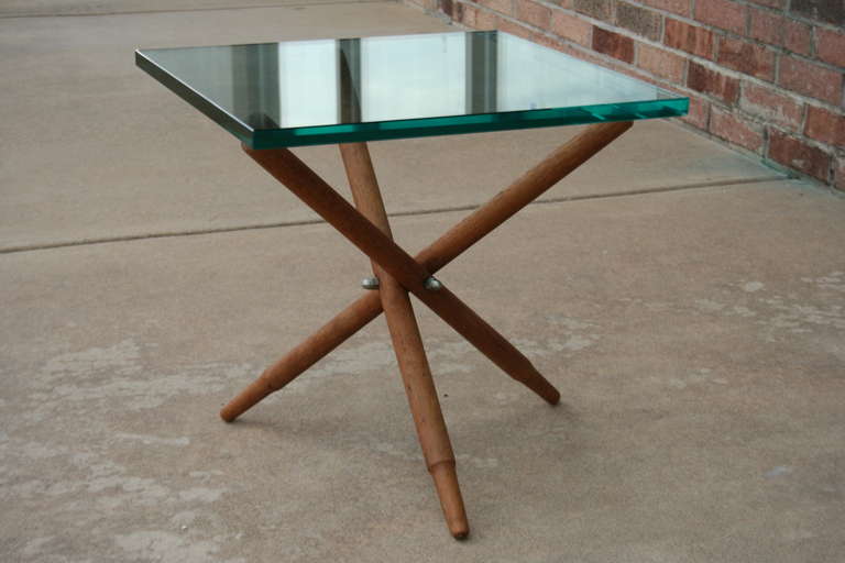 Scandinavian Modern A Scandinavian Teak and Glass Tripod Side Table For Sale
