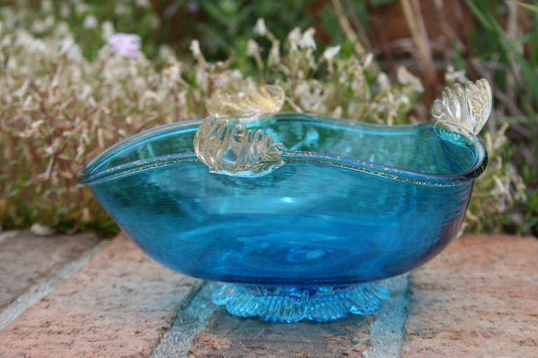 A delicate 1950's blue Murano bowl, attributed to Barovier. Applied glass hands and base, gold leaf throughout. A great piece of art glass