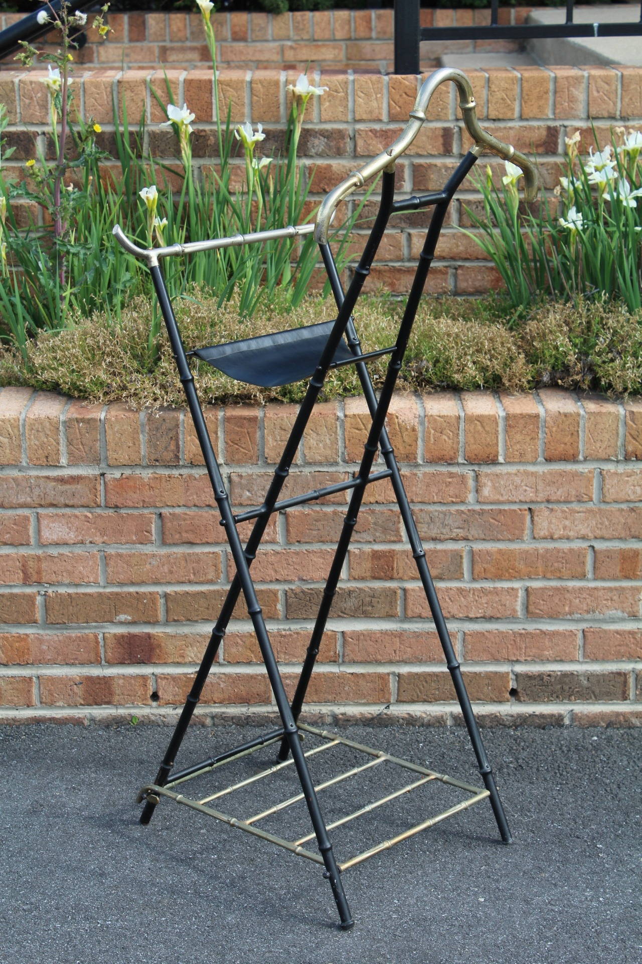 Collapsible faux bamboo and steel gentleman's valet, in the manner of Jacques Adnet, circa 1968. Well designed piece with attention to detail throughout.