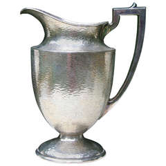 A Silver Plated Pitcher by W.M. Mounts