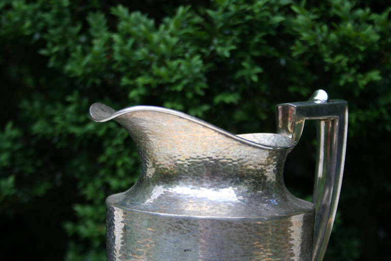 A Silver Plated Pitcher by W.M. Mounts 1