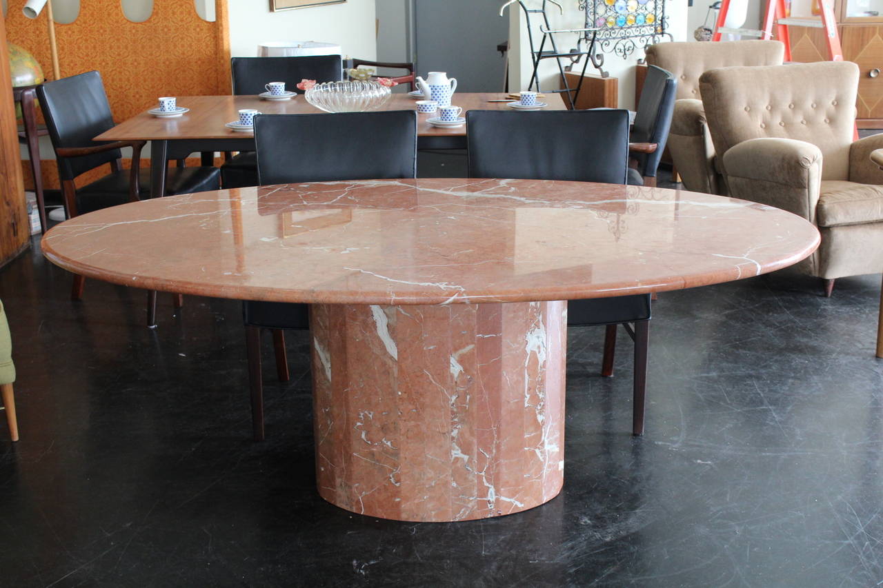 Beautiful elliptical marble dining table by Ello. 1.25