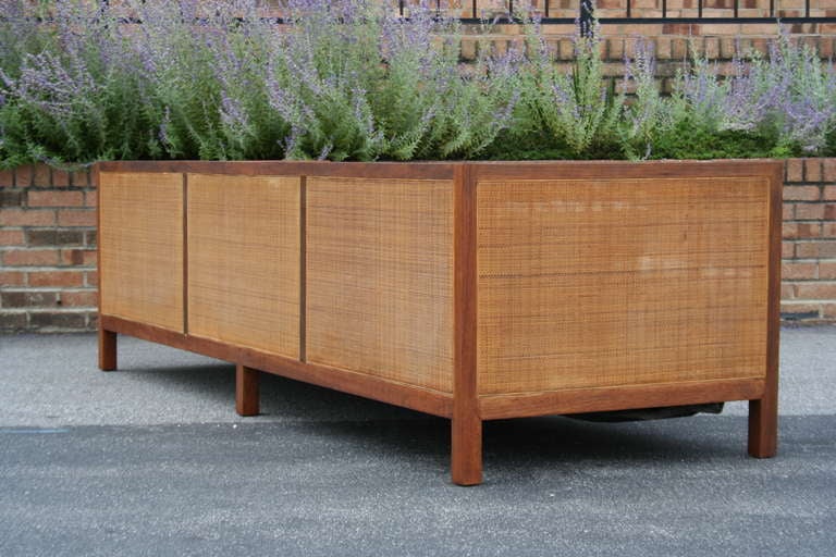 A 1950's Walnut and Cane Box Sofa
