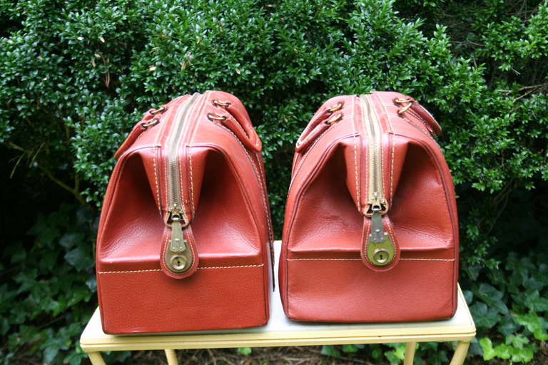 Mid-Century Modern Pair of Vintage Red Leather Bags For Sale