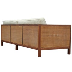 A 1950's Walnut and Cane Box Sofa
