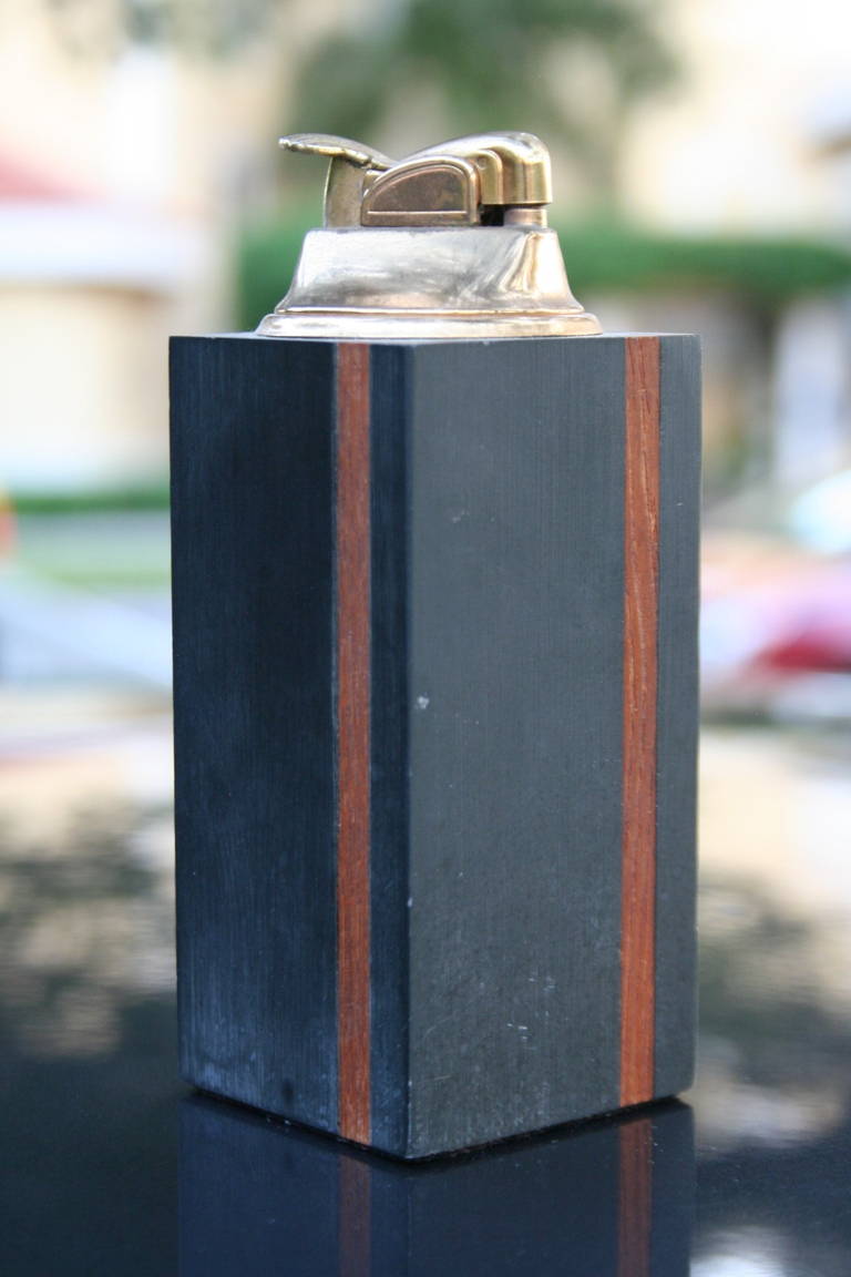 Beautifully crafted slate and teak table lighter by Harpswell house, 1970s. Manner of Paul Evans.
