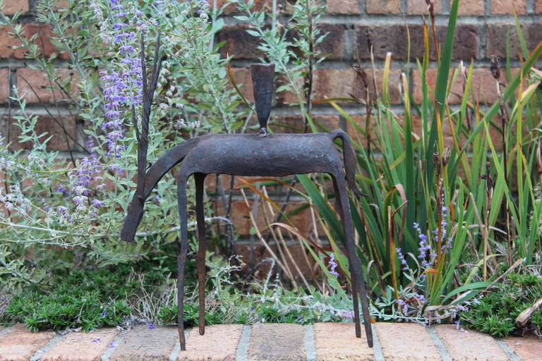Handmade Antelope table top candleholder, fine detail and texture throughout.