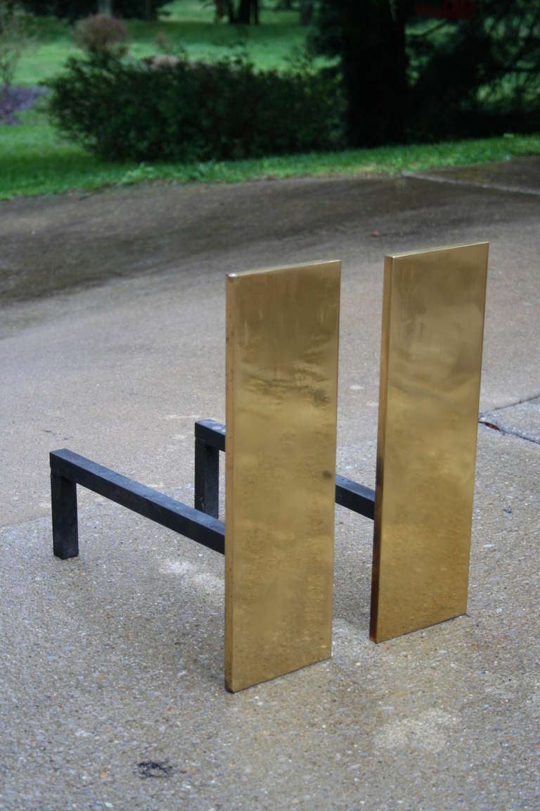 A very nice pair of solid brass andirons. Matching fireplace tools and screen also available.  Please see our other listings.