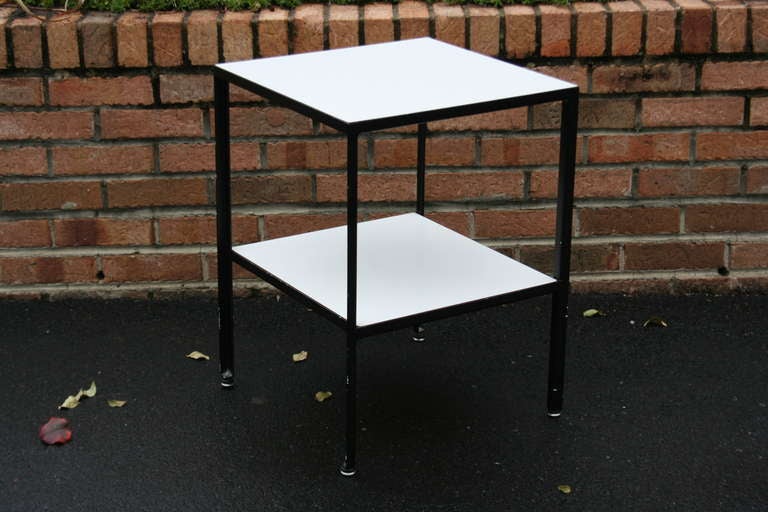 A nice enameled metal side/end table designed by George Nelson for Herman Miller, c. 1960. This table was a part of Nelson's Steelframe Case Group manufactured by Herman Miller.