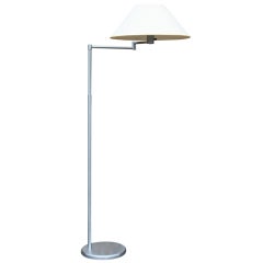 A Brushed Nickel Swing Arm Floor Lamp by Nessen 