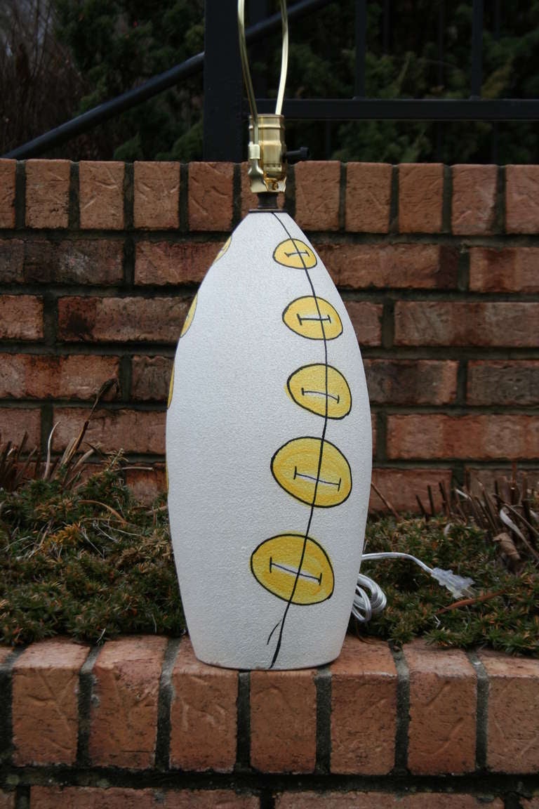 Pottery An Italian White and Yellow Ceramic Table Lamp For Sale