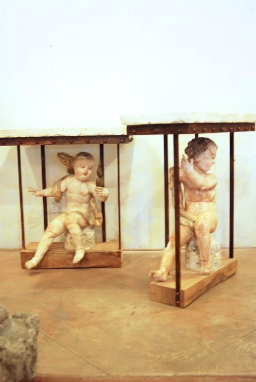Pair of 18th c puttis console.