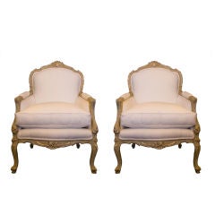 Simon Djeredjian French pair of paint and gilded arm chairs.