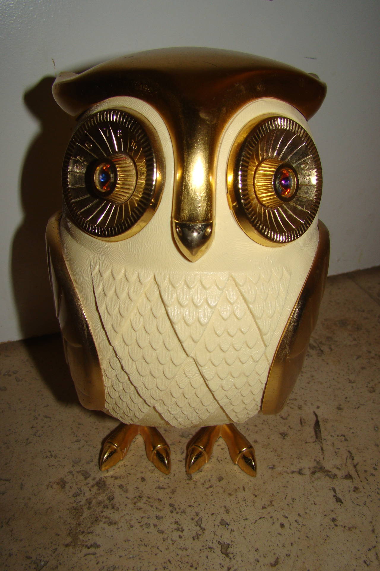 Terrific vintage owl transistor radio. This super cute design is comprised of brass and plastic with jeweled eyes in the form of an owl. The legs come off to reveal the battery compartment. Radio works! Truly a unique design in person.