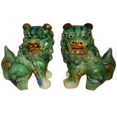 Pair of Mid Century Glazed Pottery Foo Dog Sculptures