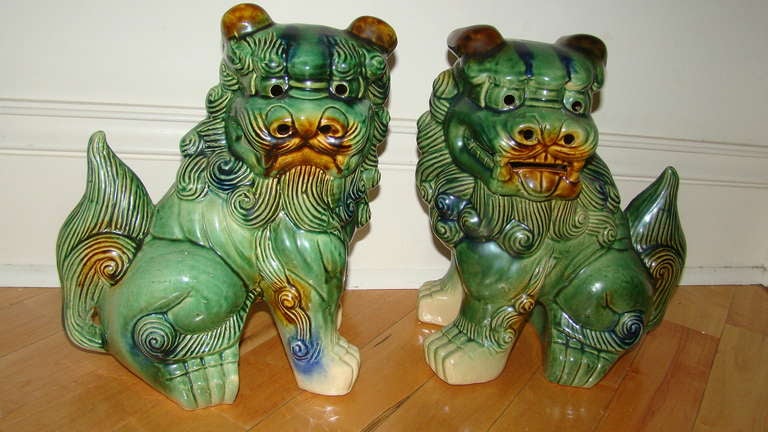 Pair of Mid Century Glazed Pottery Foo Dog Sculptures In Excellent Condition In Atlanta, GA