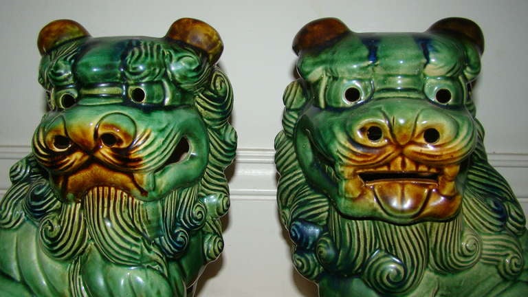 Late 20th Century Pair of Mid Century Glazed Pottery Foo Dog Sculptures
