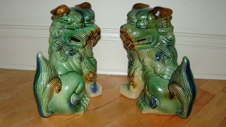 Pair of Mid Century Glazed Pottery Foo Dog Sculptures 1