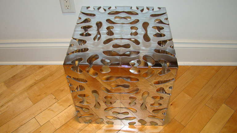 Mid Century Sculptural Puzzle Table. This interesting piece is comprised of solid Chrome in a unique 
