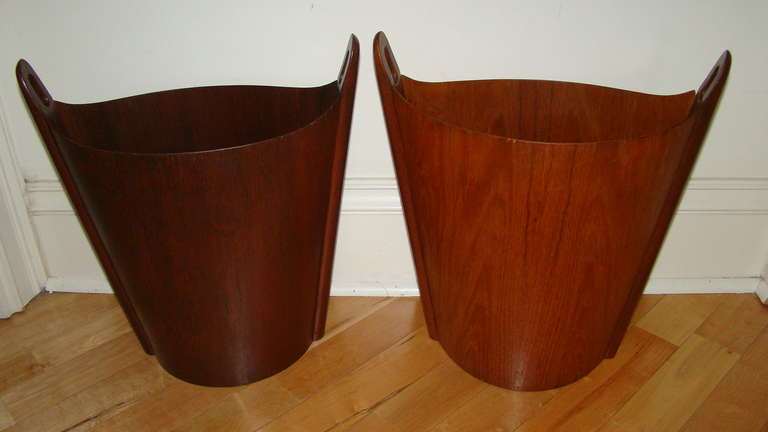 Beautiful pair of Sculptural Waste Baskets designed by Einar Barnes for P.S. Heggen, Norway.  Each are comprised of teak & rosewood veneers.  These are often used as umbrella stands or stacked as sculptures as well.