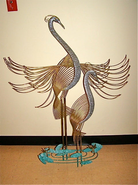 Outstanding Mid Century Wall Hanging sculpture by Curtis Jere. This beautiful piece is comprised of abstract brass wires with chrome bodys that depict a pair of tropical birds sitting on lillys. Truly an amazing piece in person! Signed and dated C