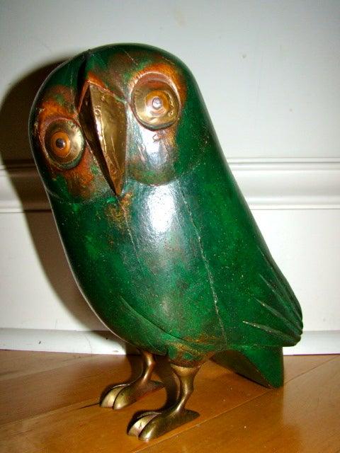 Terrific Whimsical Owl Sculpture by Mexican Master Sergio Bustamante. This interesting piece is comprised of a hand carved wood body with hand hammered face and solid brass feet. This is the largest version of the series. Signed and numbered 57/100.