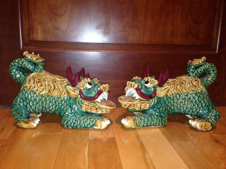 Pair of Mid Century Glazed Pottery Foo Dog Sculptures