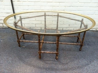 Terrific Faux Bamboo Coffee Table by Baker. This beautiful design is comprised of a Faux Bamboo wood base with painted tortoise shell oil drop finish. A large Brass & Glass Tray style top rests on the base. Truly a beautiful design!