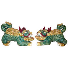 Pair of Mid Century Glazed Pottery Foo Dog Sculptures