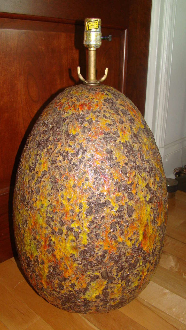 Terrific Mid Century Italian Pottery Large Egg Shaped Lamp possibly by Gambone or Fantoni. Comprised of thick heavy pottery with beautiful Orange,Yellow and Brown Volcanic Glaze.