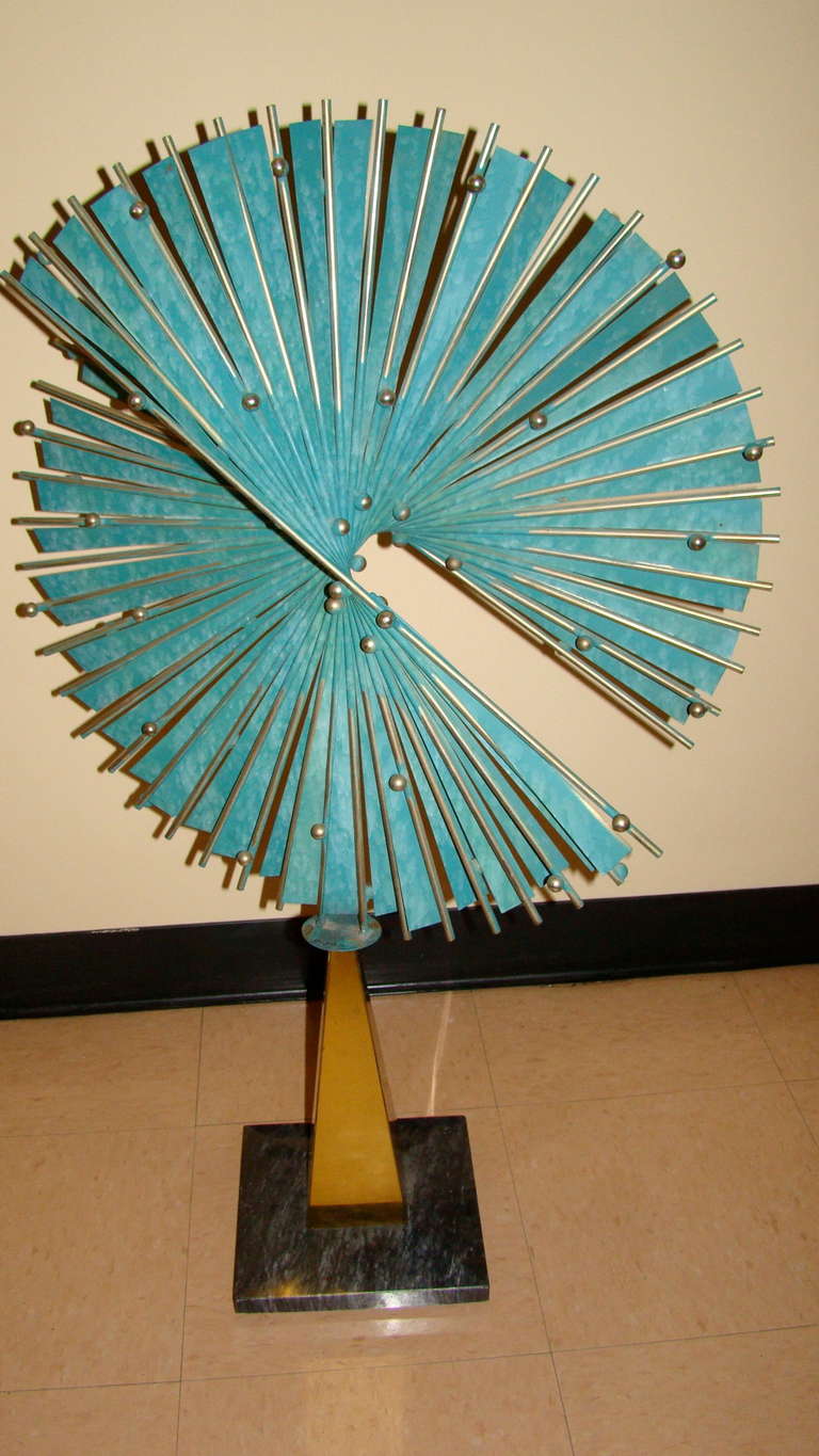 Terrific Abstract Table Sculpture by C Jere, 1972. This interesting piece is extremely well made with Verdigris patina welded metal rods in a twisted blade form with brass and solid marble base. Truly a beautiful and substantial sculpture in person!