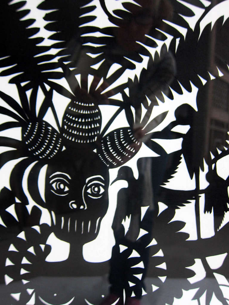 Born in Guadalajara, Margarita Fick is a self-taught artist who wields scissors, chisels and blades to expertly create scenes in cut paper. The 2 shown honor the dancers Carmen Miranda and Tongolele and the subject matter lends itself to  joyous