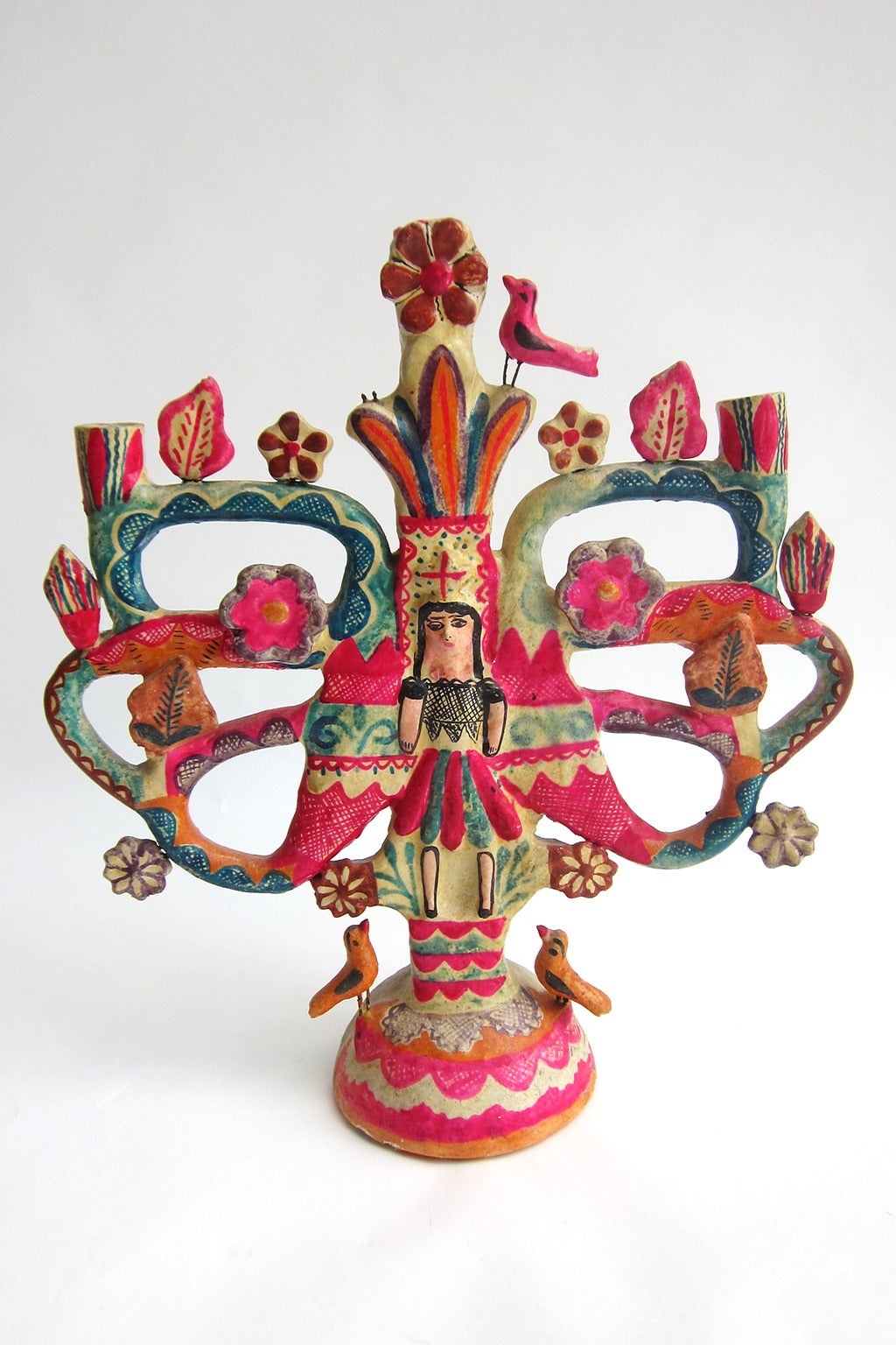 This wonderful example is from an endangered Folk Art, since it is only produced in its original style by Francisco, the only son of Aurelio Flores, once master of this popular art form. According to him, these endearing species were originally used