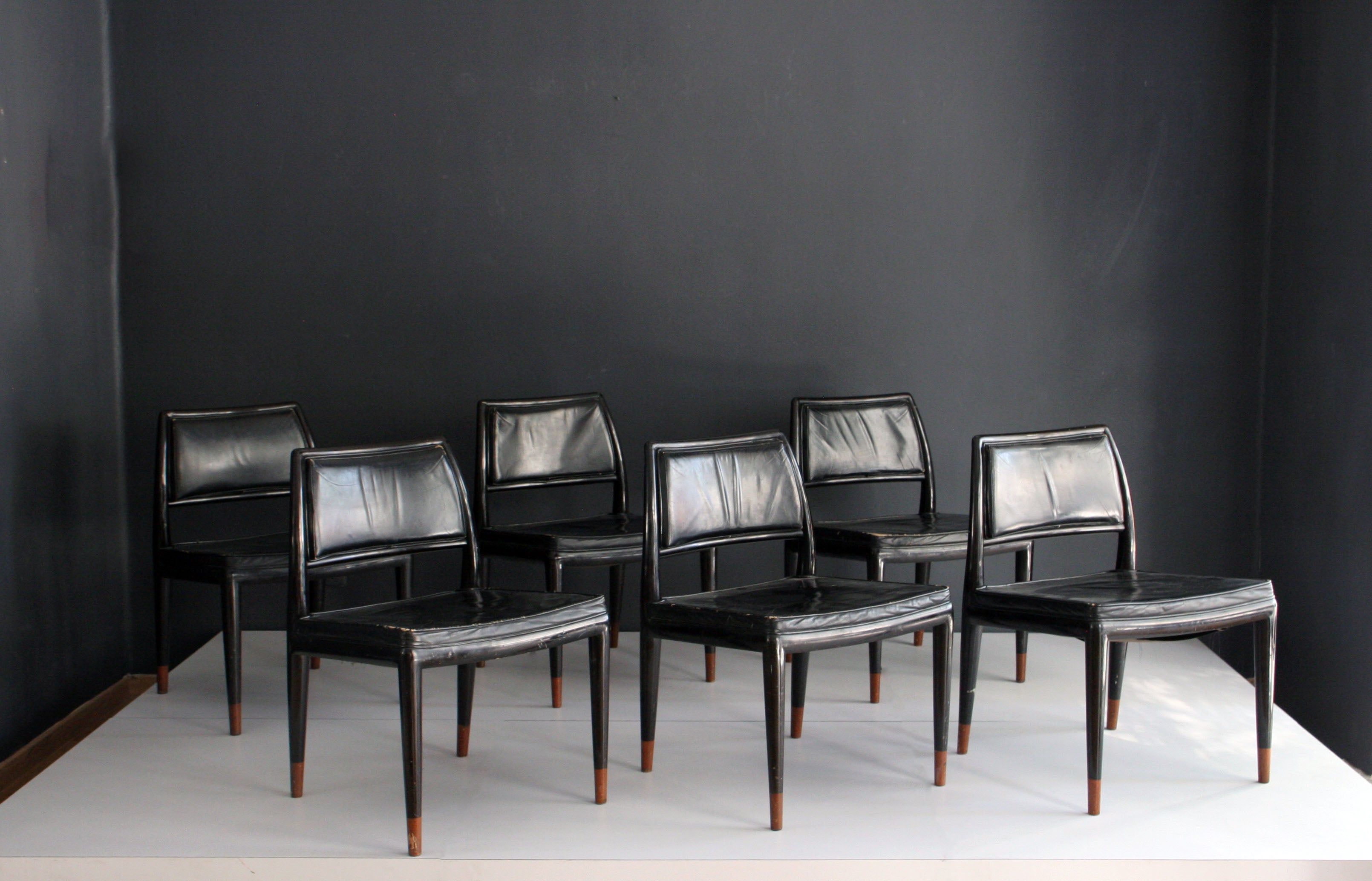 Set of six Frank Kyle black leather chairs