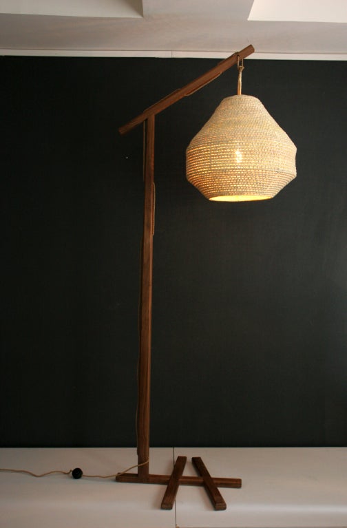 Walnut Floor Lamp. Perfectly crafted. Solid Walnut and and hand woven Palm shade. Contemporary design by Perla Valtierra for ADN Gallery.