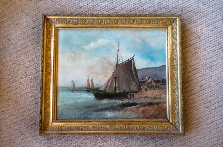 A beautiful oil painting of a sailboat being launched onto the open sea. This piece is signed by the artist, 