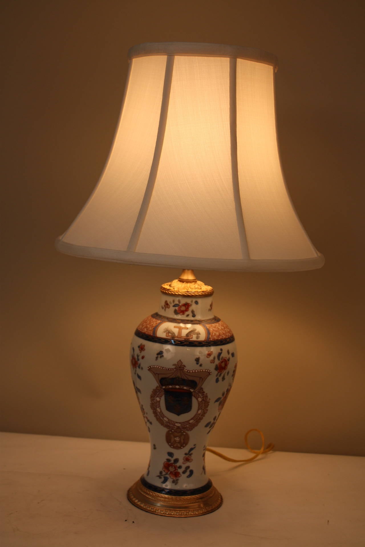 Beautiful painted porcelain lamp with great bronze mounting.