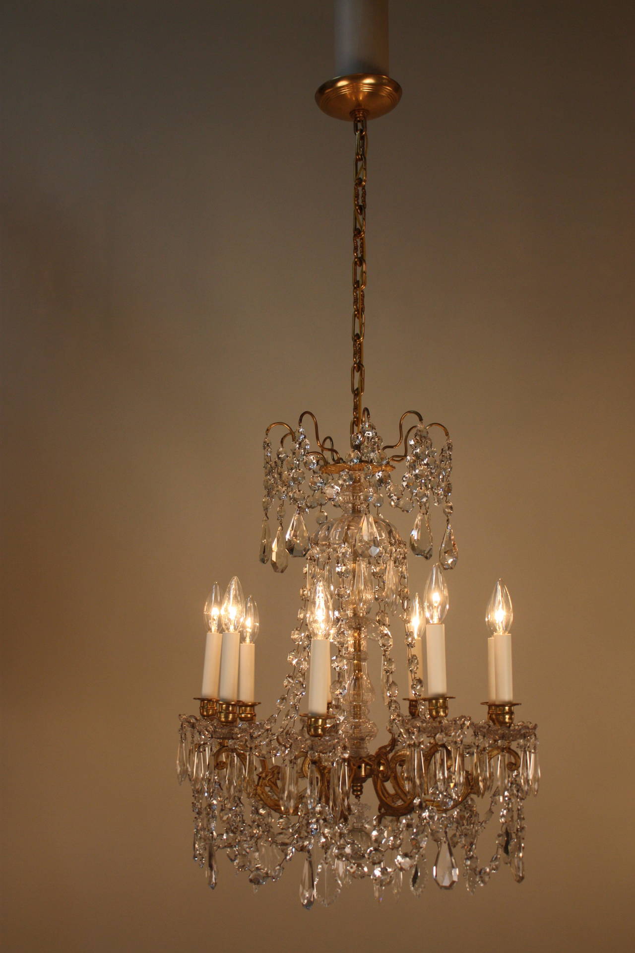 Beautiful late 19th century nine-light crystal chandelier by Portieux.