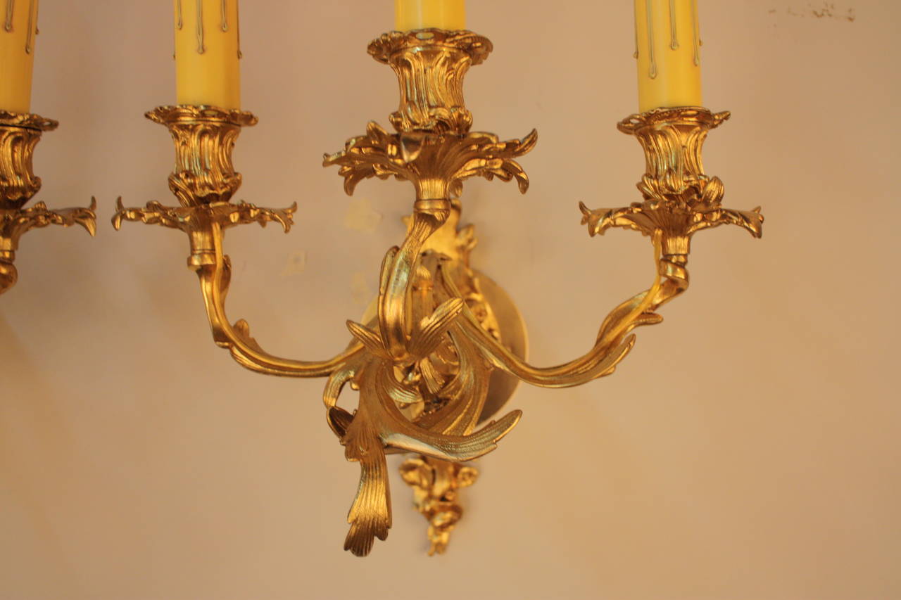 This stunning pair of 19th century three-light Art Nouveau wall sconces will provide a touch of elegance to any space.